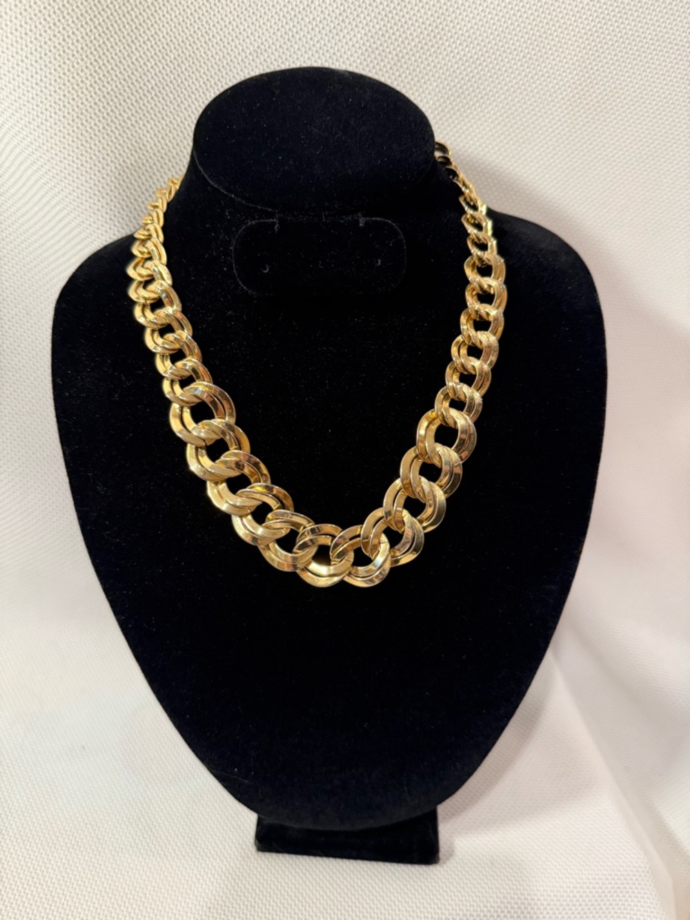 Double curb graduated link gold tone necklace